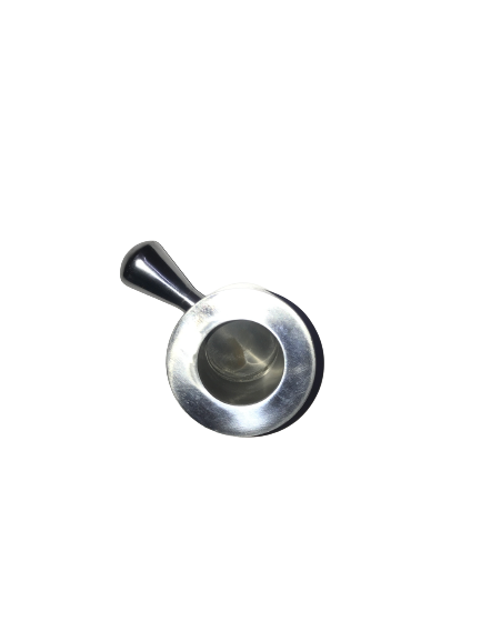 man wearing a black jacket, white shirt, blue jeans, and brown boots, playing a white electric guitar while sitting on an amp